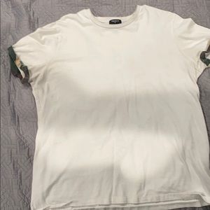 White shirt with camo on the outs